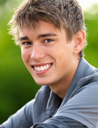 teen guy smiling