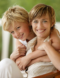 woman and young boy smiling