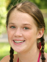 young girl wearing braces