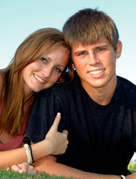 young guy and girl smiling