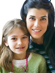 woman and young girl smiling